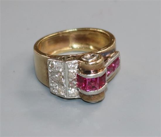 A 1950s? yellow metal, ruby and diamond cluster cocktail ring, size K.